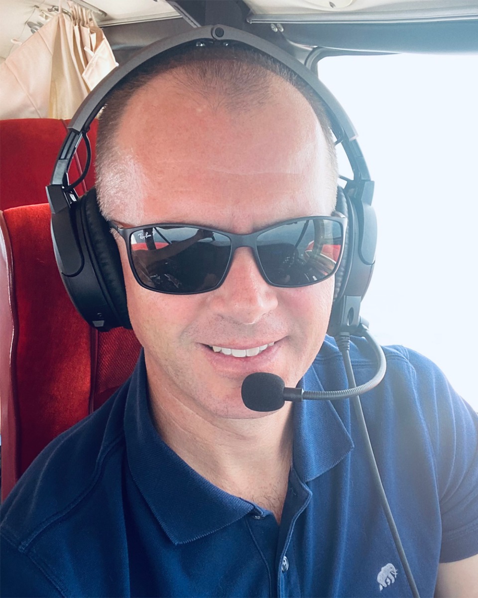 Eric Radtke flying plane with Bose headset